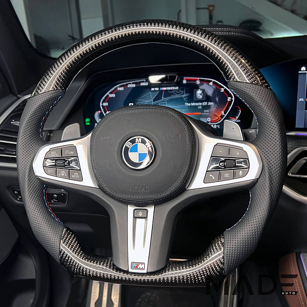 Изменение анатомии руля BMW X5 G05 с ламинацией карбоном и установкой подогрева