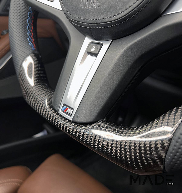 Изменение анатомии руля BMW X5 G05 с ламинацией карбоном и установкой подогрева